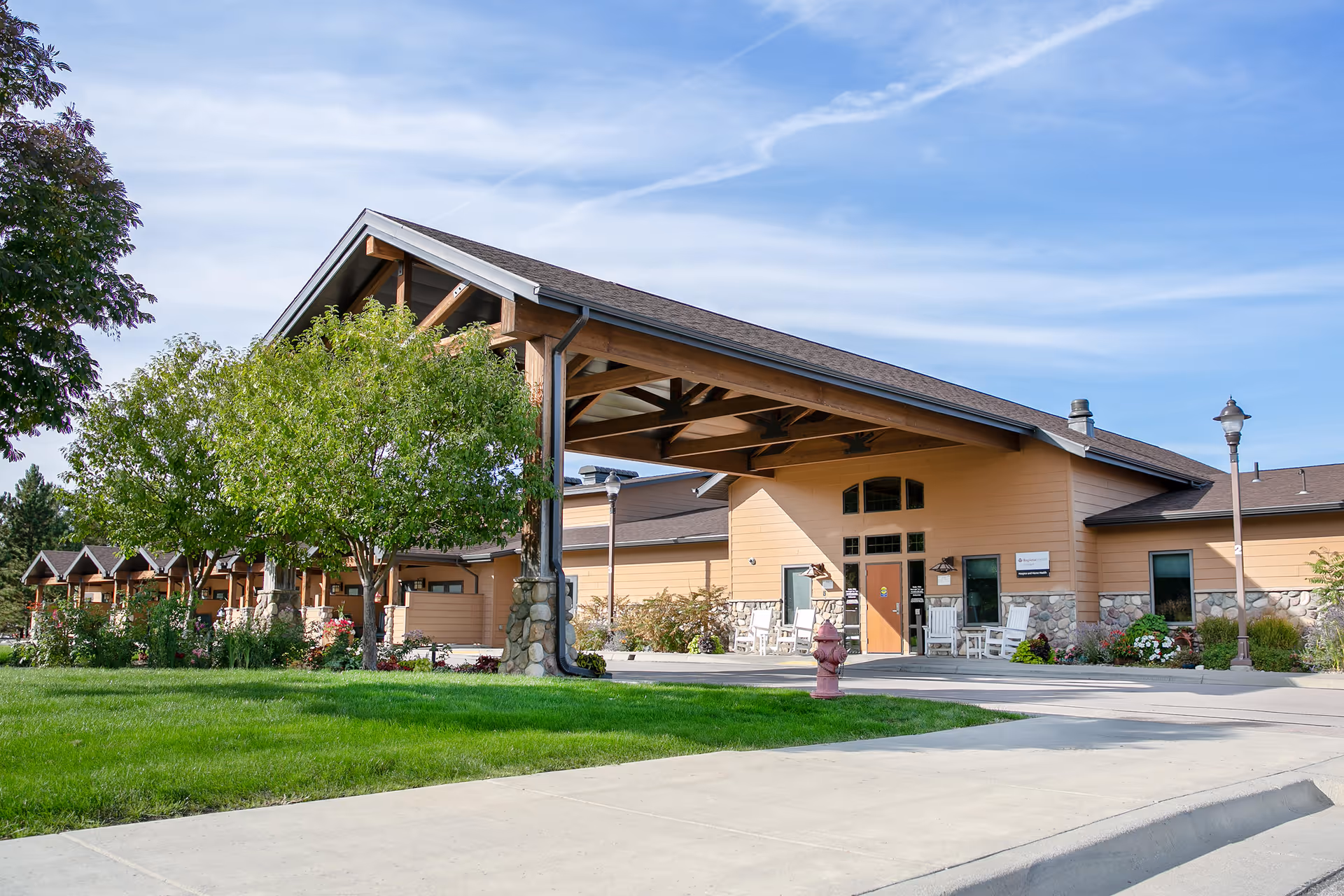Exterior view of Monument Health Home Infusion with a covered entrance.