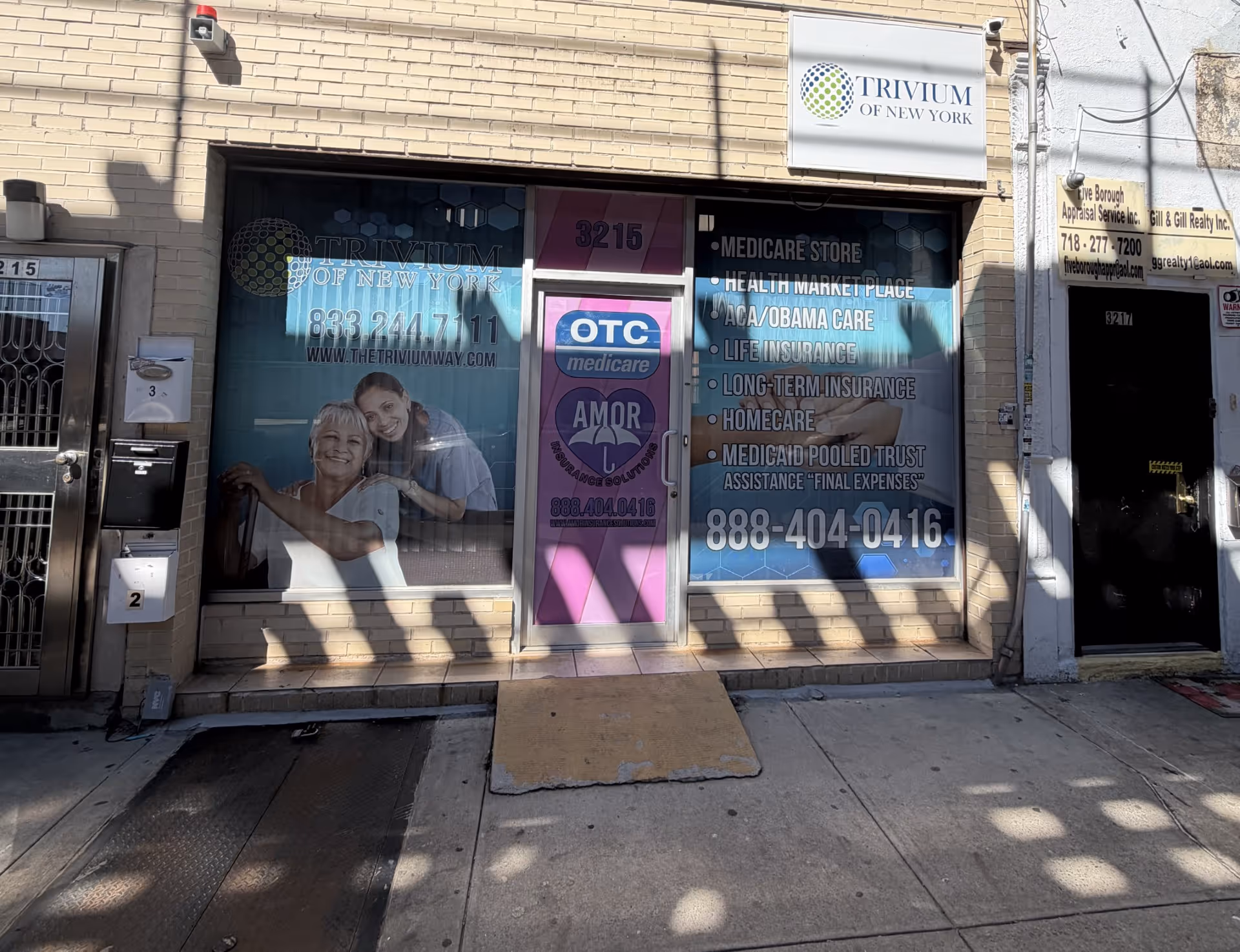 Exterior storefront of Trivium of New York with large window graphics.
